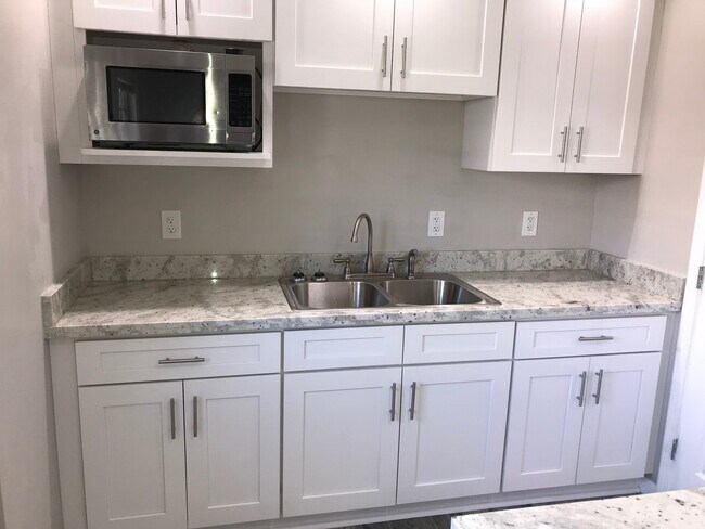 Kitchen - sink granite tops - 4443 Jacqueline Dr