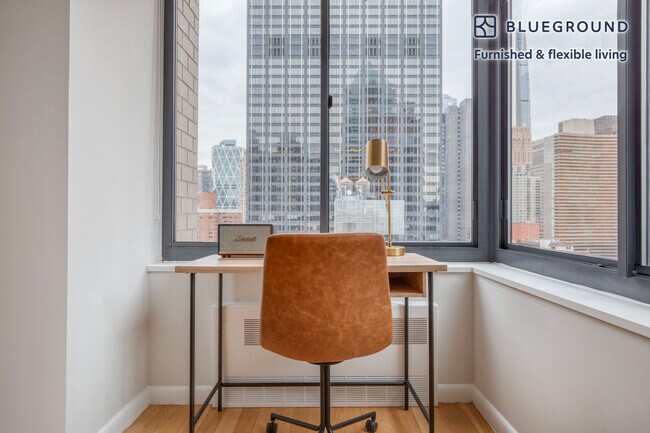 Foto del edificio - 235 W 48th St