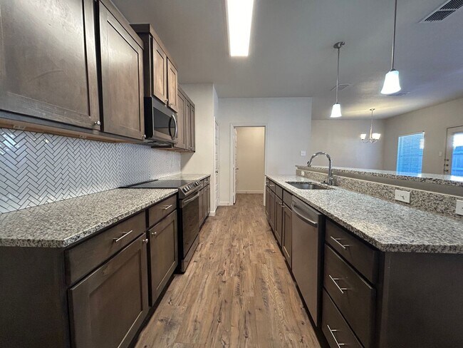 Building Photo - Beautiful New Townhome Located South Of To...