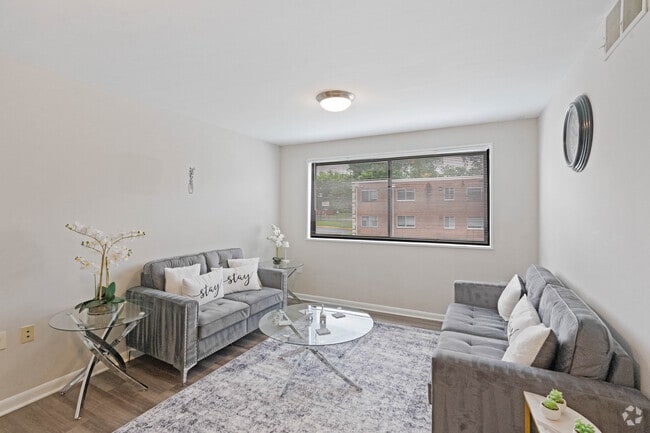 2BR, 1BA - 833SF - Living Room - Flats of Forestville Apartments