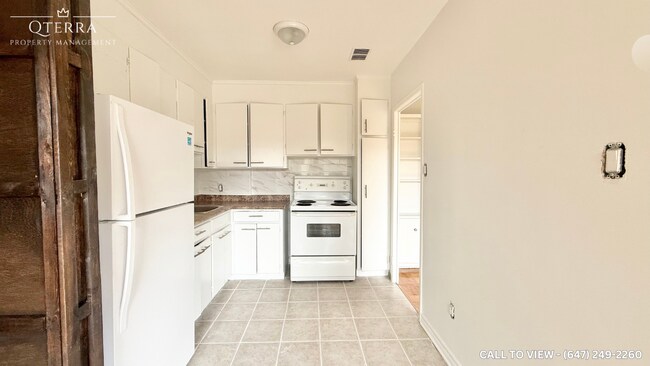 Photo du bâtiment - 6 Kings Point Dr