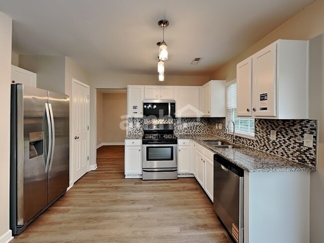 Building Photo - 1701 Moss Creek Dr