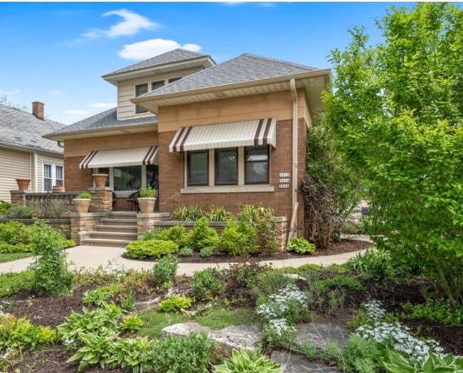 Front with side garden - 1614 S 58th St