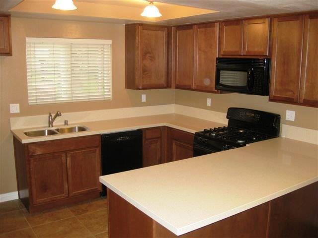 Cocina con nuevos gabinetes y encimeras de cuarzo - 1507 Prospect Ave
