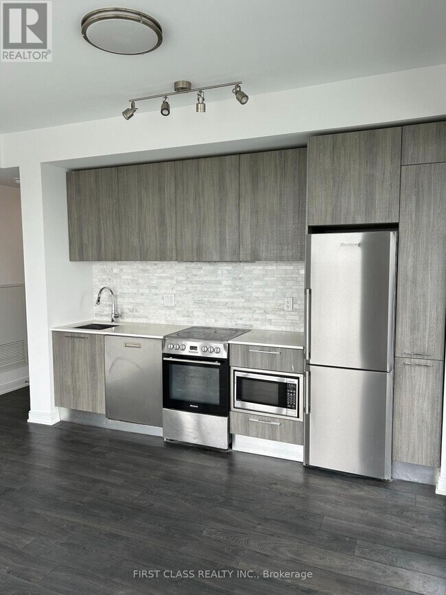 Photo du bâtiment - 50 Charles St E