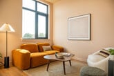 This 350 square foot apartment in Philadelphia offers a well-designed living space in a compact footprint. The single-floor layout features one bedroom, one bathroom, a kitchen, and a living room. The primary bedroom, measuring 110 square feet, boasts a cane headboard, full-length mirror, and ample storage with built-in closets.

The living area is bright and airy, with large windows providing stunning city views and natural light. A mustard-colored sectional sofa anchors the space, complemented by a modern coffee table and floor lamp. The kitchen, though compact, is efficiently designed with sleek cabinetry, open shelving, and a textured backsplash. It features a deep sink and dark countertops, offering both style and functionality.

The bathroom showcases a contemporary design with dark tile contrasting against white walls, a glass-enclosed shower, and a floating vanity. The apartment's overall aesthetic is modern and minimalist, with a neutral color palette accented by pops of color in the furnishings. Hardwood floors throughout add warmth to the space.

Despite its small size, the apartment maximizes every square foot, creating a comfortable and stylish urban dwelling. The layout and design choices make the space feel larger than its actual dimensions, perfect for those seeking an efficient city lifestyle.