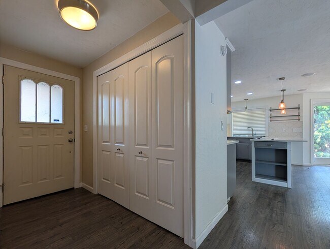 Building Photo - Updated 3-Bedroom, 2.5-Bath Home ~ Solid Surface Flooring and Spacious Kitchen!