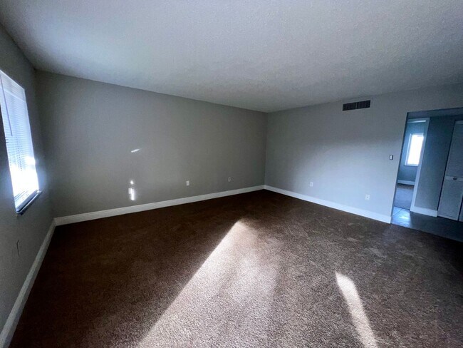 Foto del edificio - Spacious 3 Bed / 2 Bath Condo in Millennium Palms – Gated Community with Great Amenities!