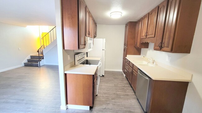 Building Photo - 2 bedroom, 1.5 bath townhome with 2 parkin...