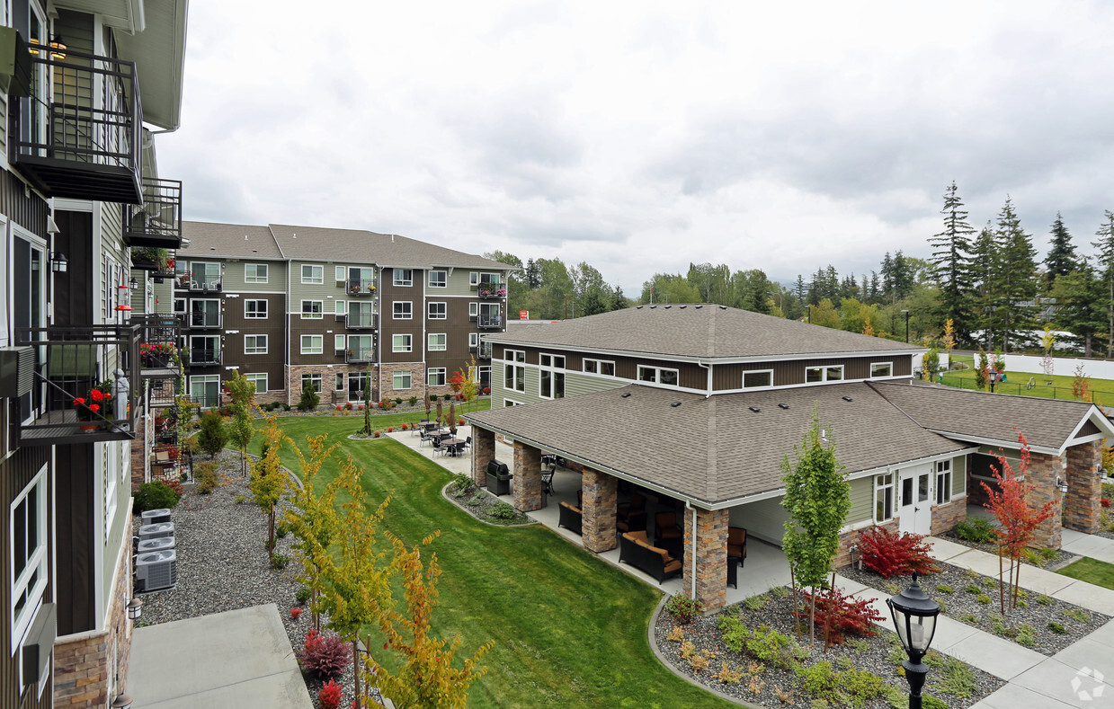 Back Lawn and Pool House - Affinity at Bellingham 55+