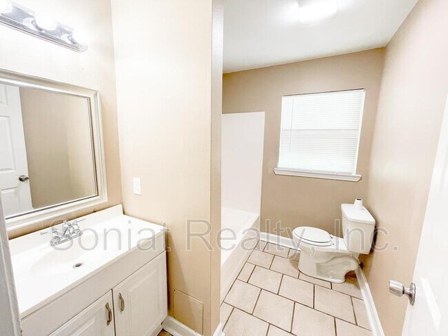 Building Photo - 4986 Kendall Dr