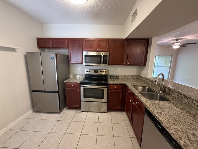 Building Photo - FIRST-FLOOR 3 BEDROOM CONDO IN VILLAGES OF BLOOMINGDALE!