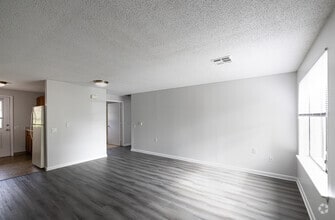 1BR, 1BA Classic - 800SF - Living Room - Briar Knoll Apts