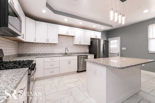 Foto del edificio - Come view this adorable home