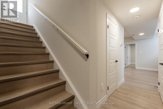 Photo du bâtiment - 6437 Heathwoods Ave