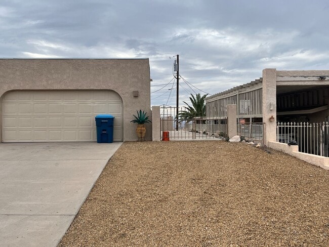 Building Photo - Beautifully Fully Furnished Longterm Pool Home