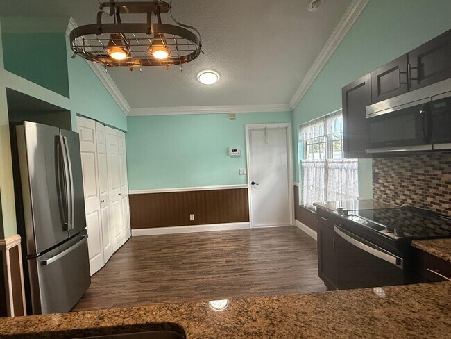 Foto del edificio - 9707 Sun Pointe Dr