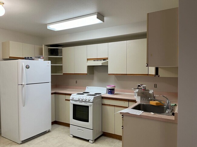 Photo du bâtiment - 2 Bed 1 Bath Unit in Olds, AB