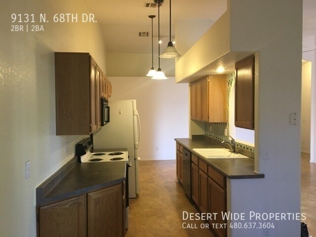 Building Photo - 9131 N 68th Dr