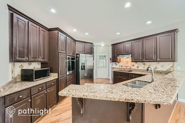 Building Photo - 4409 Cabinwood Turn