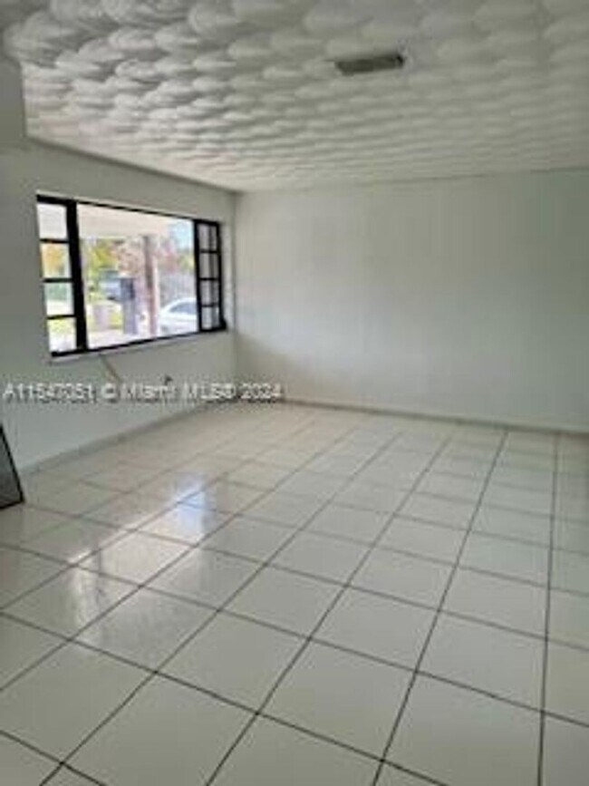 Building Photo - 7495 S Waterway Drive, Miami, FL 33155