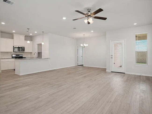 Building Photo - 3 Bedroom 2 bath, 2 garage attached garage with all the appliances to include washer & dryer