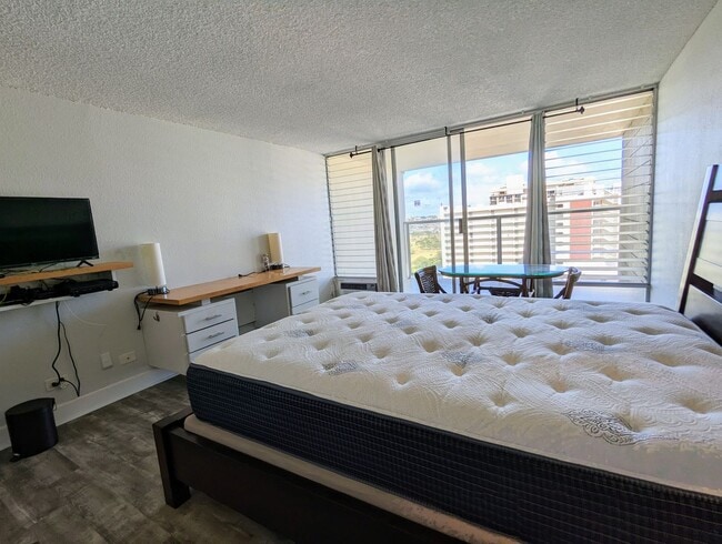 Building Photo - Partially Furnished  Studio with 1-Bath at...