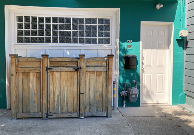 Front Entrance w/ Glass Brick and bin holder - 240 Duncan St