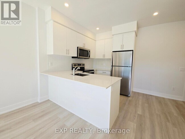 Photo du bâtiment - 1100 Lackner Pl