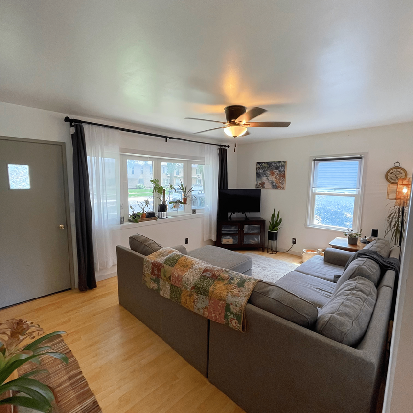 Living room with large bay window - 4069 S Packard Ave