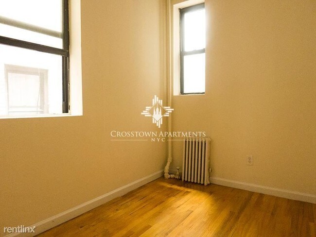 Foto del edificio - 209 E 3rd St