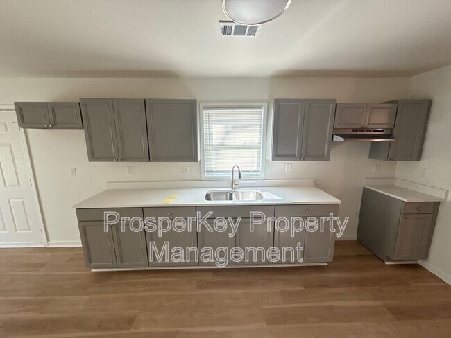 Foto del edificio - 1413 John Smith Ave