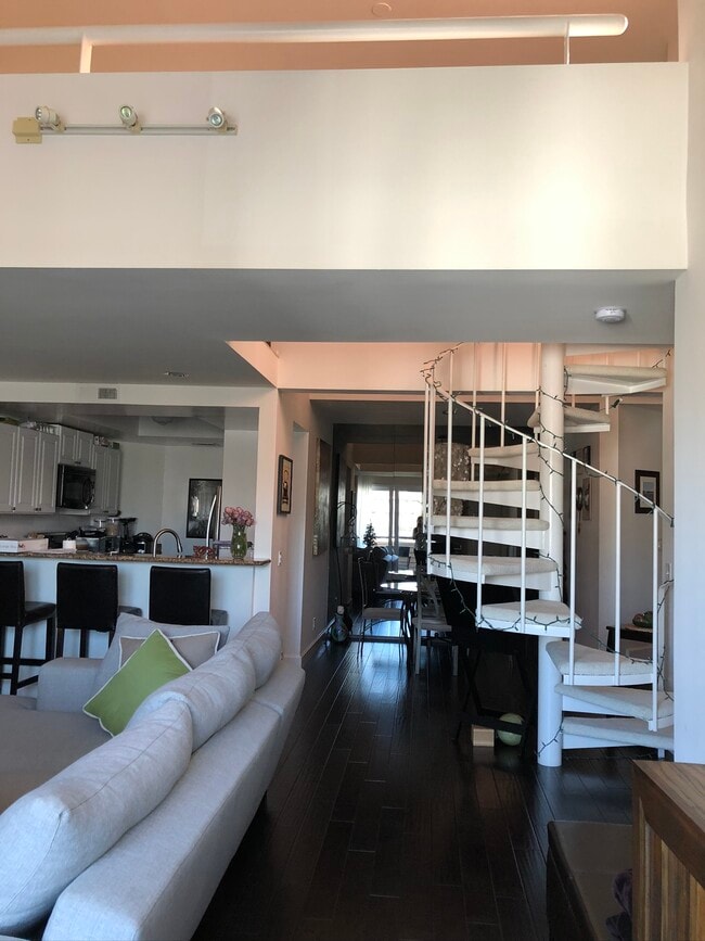 Spiral staircase leading up to loft/sundeck - 1808 Manning Ave