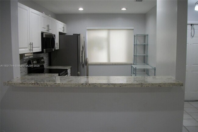Building Photo - 20884 NW 1st St