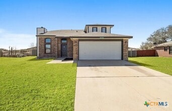 Building Photo - 3103 Redbud Dr