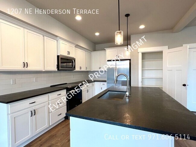 Building Photo - Contemporary 4 Bedroom home located in the...