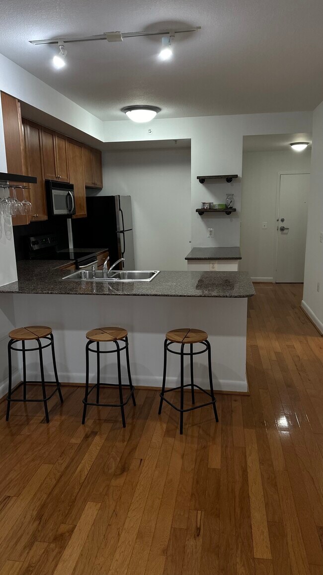 Kitchen view from living room - 400 Massachusetts Ave NW