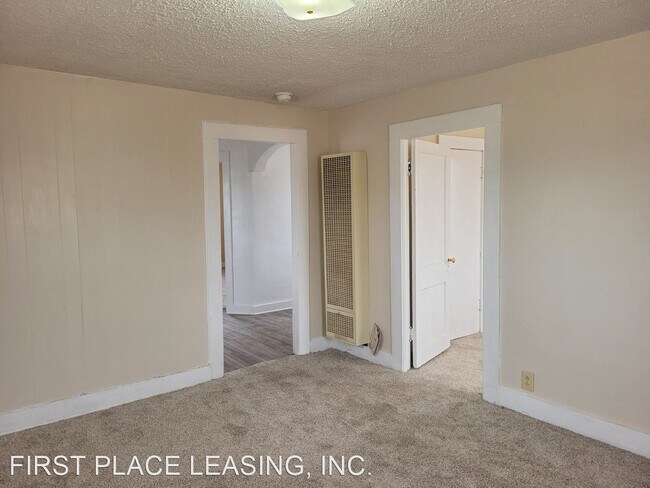 Building Photo - 2 br, 1 bath House - 1303 E. 4th St.