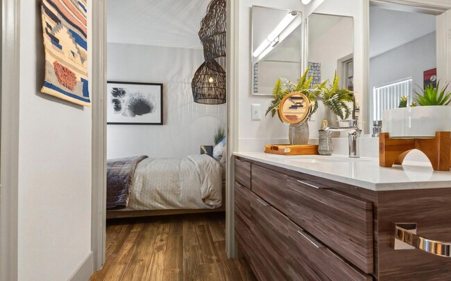 Bathroom with Vanity Connected to Bedroom Entryway - REVERB