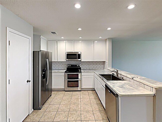 Foto del edificio - 8901 King Ranch Dr