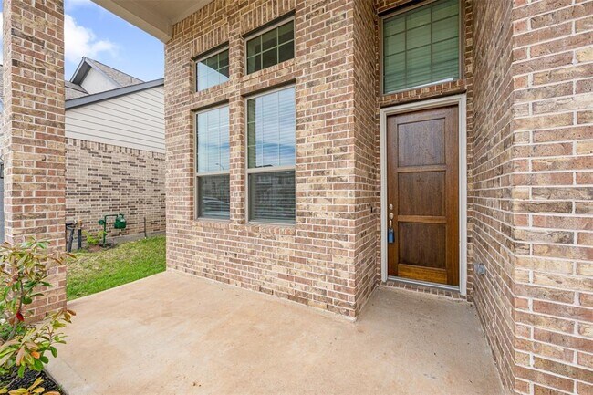 Building Photo - 8714 Windsong Trail Dr