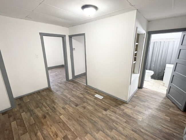 Building Photo - 4 Bedroom Home with garage/workshop combo ...