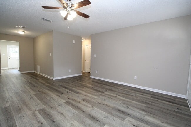 Building Photo - 2-Bed, 2-Bath Milton Duplex – Minutes from Highway 90, Open Layout with Luxury Vinyl Flooring and...