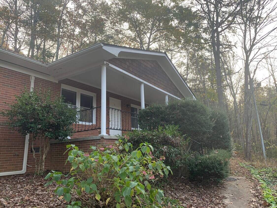 Front door porch. Back door is off private parking lot. - 9 Tree Canopy Ln