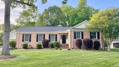 Building Photo - 6810 Rosemary Ln
