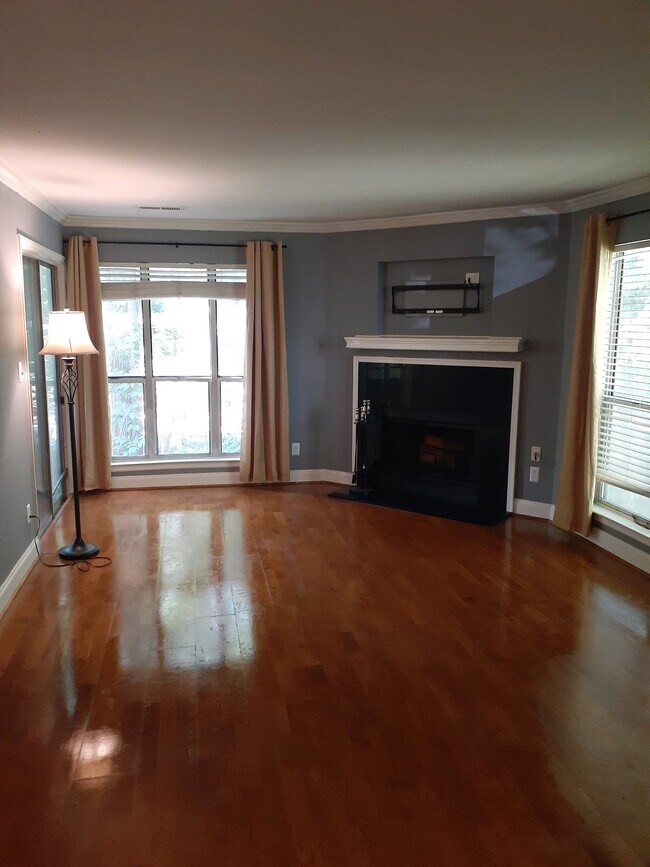 Fireplaced Living room with access to private balcony - 2514 Cranbrook Ln