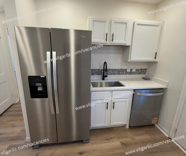 Foto del edificio - Spacious 4-Bedroom • 2-Bathroom Single-Family Home