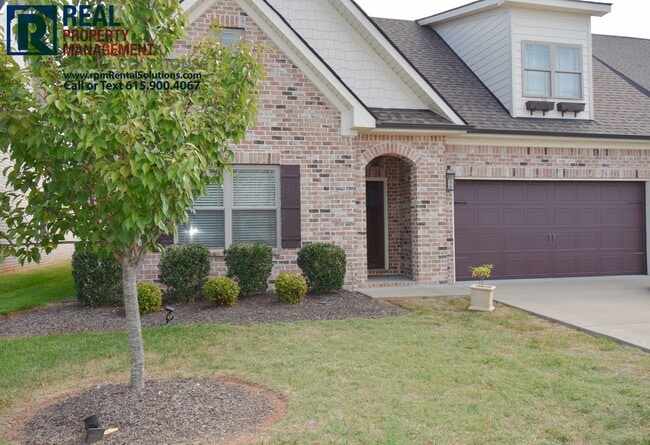 Building Photo - All brick 4 bedroom home plus Bonus room! Garage and covered patio!