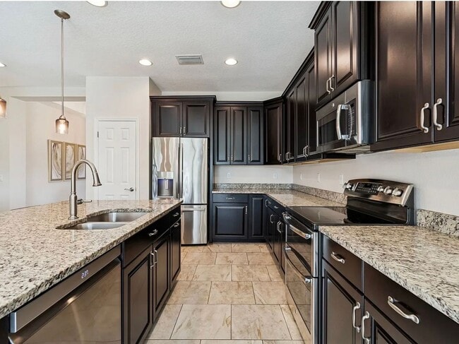 Building Photo - 3987 Sunset Lake Dr