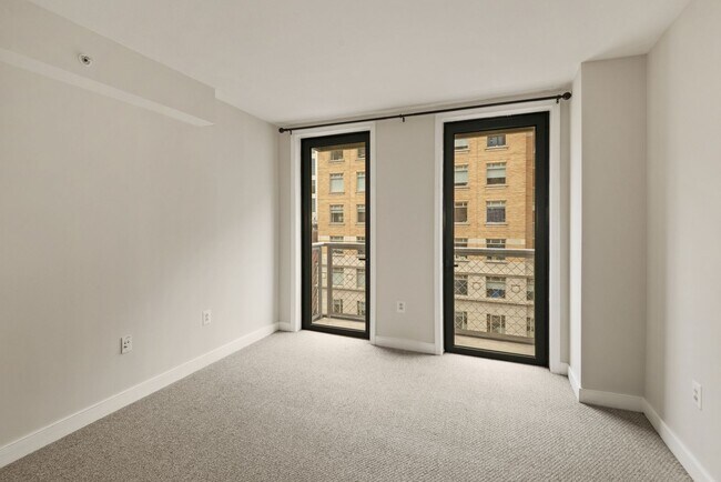 Building Photo - $400 Off! Professionally Managed, Spacious...